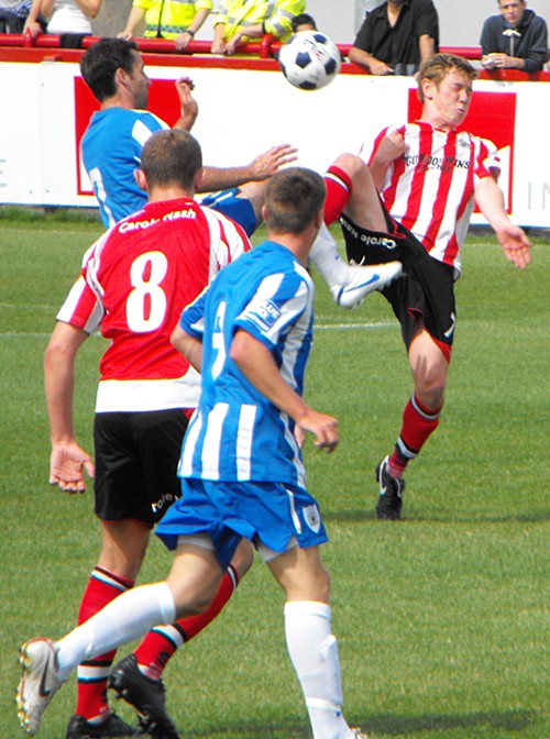 Tom Peers of Altricham contests a header with David Ferguson of Hartlepool  United during the Vanarama National League match between Hartlepool United  and Altrincham at Victoria Park, Hartlepool on Tuesday 27th October