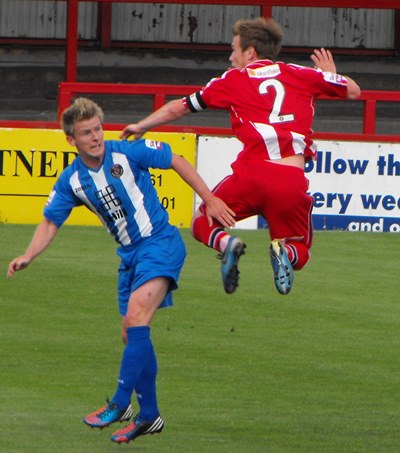 Southend United FC Exiles - Altrincham have a Robin mascot. I don't know  its name though.